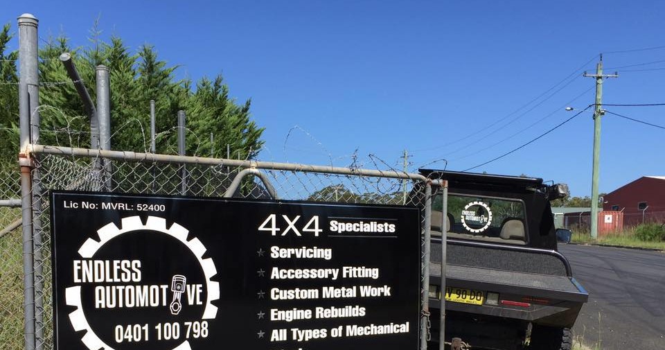 The Endless Automotive signboard listing 4x4 specialists, servicing, accessory fitting, custom metal work and engine rebuilds